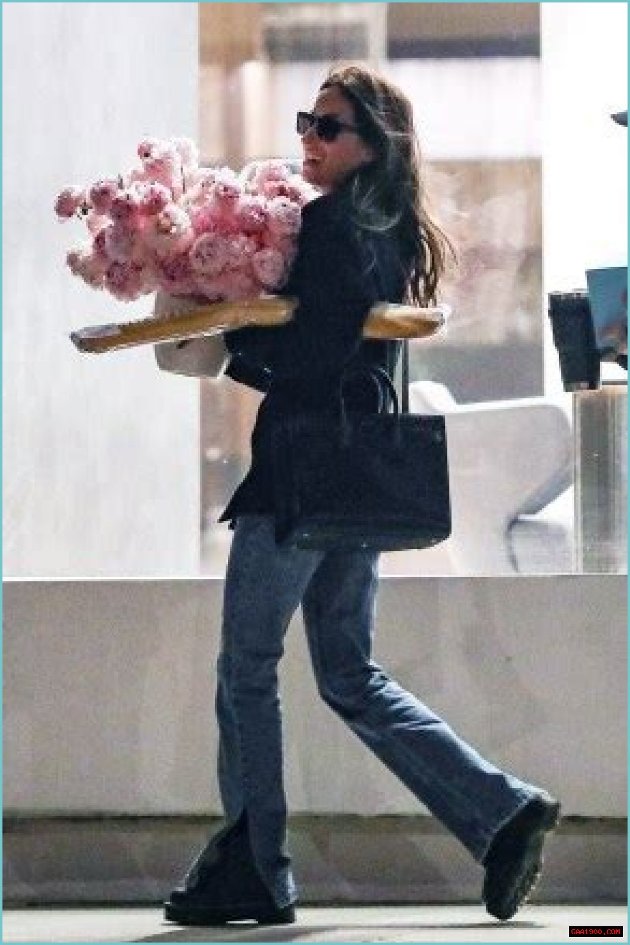 Brad Pitt’s GF Ines de Ramon Is All Smiles As She Leaves Work With Flower Bouquet On Valentine’s Day